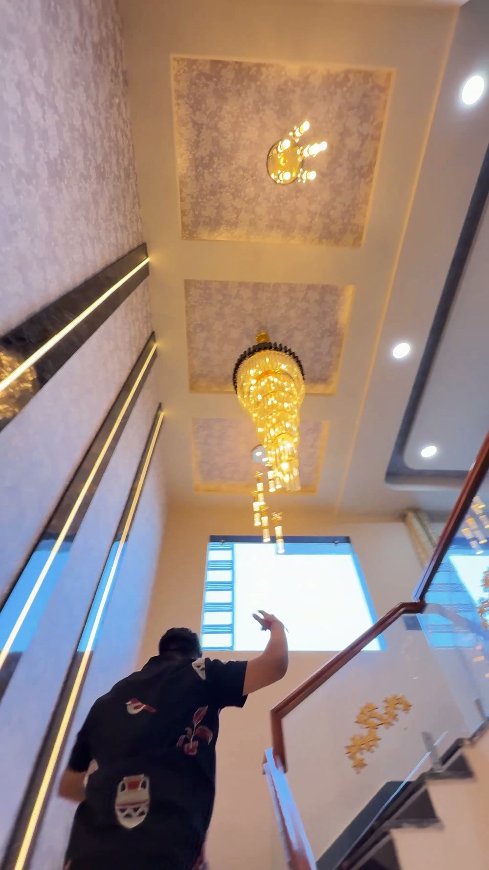 Staircase with chandelier in 4 BHK kothi Jaipur